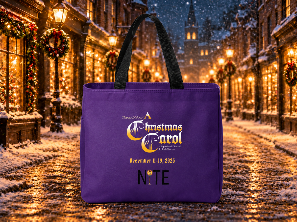 Purple tote bag with black straps with A Christmas Carol production and NITE Theatre logos printed